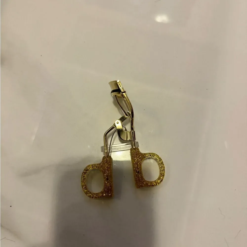 Gold eyelash curler #18